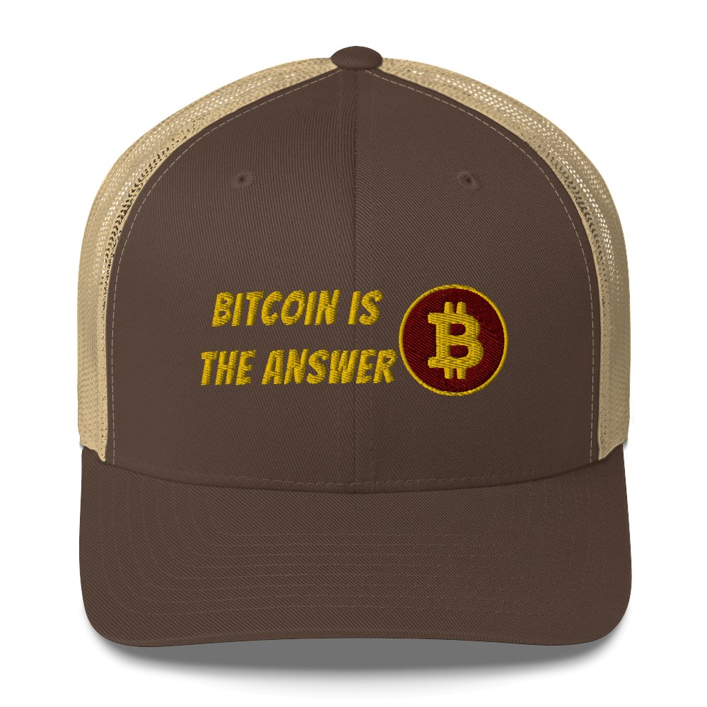 A brown and tan UTXO Dreams Bitcoin trucker cap with the phrase "bitcoin is the answer" embroidered above a bitcoin symbol on the front panel.